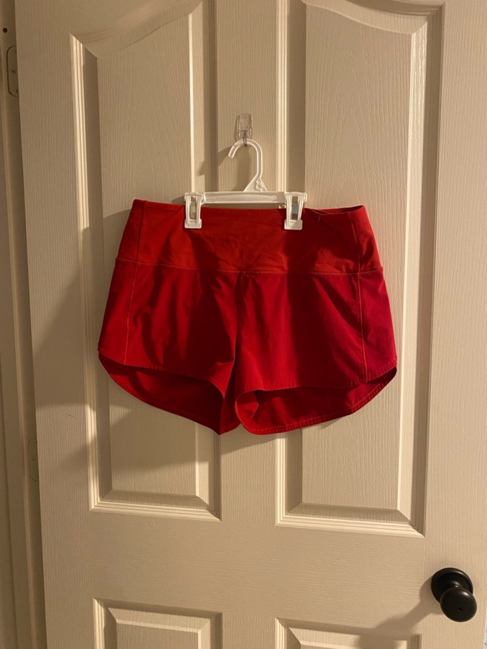 Red Women’s Lululemon speed up shorts 2.5”